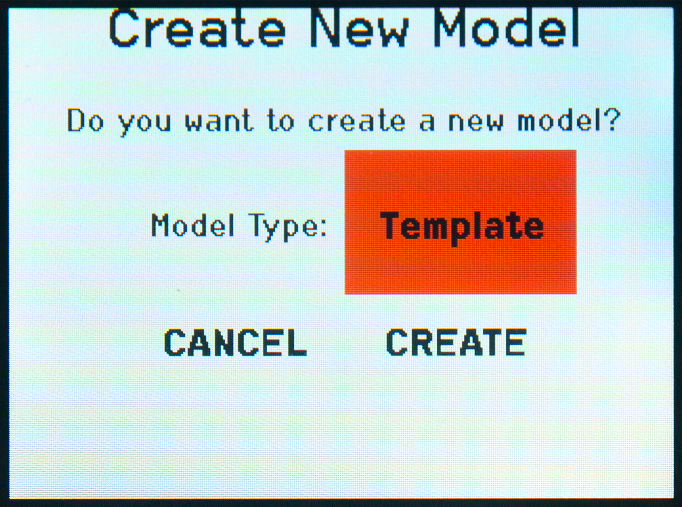 Image of the NX8 Transmitter's light backlit screen displaying the Create New Model template screen